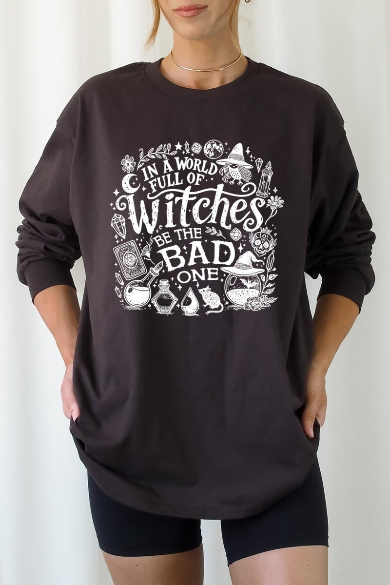 UL240P-E3139 In a World of Witches Graphic Plus Long Sleeve Tee $17