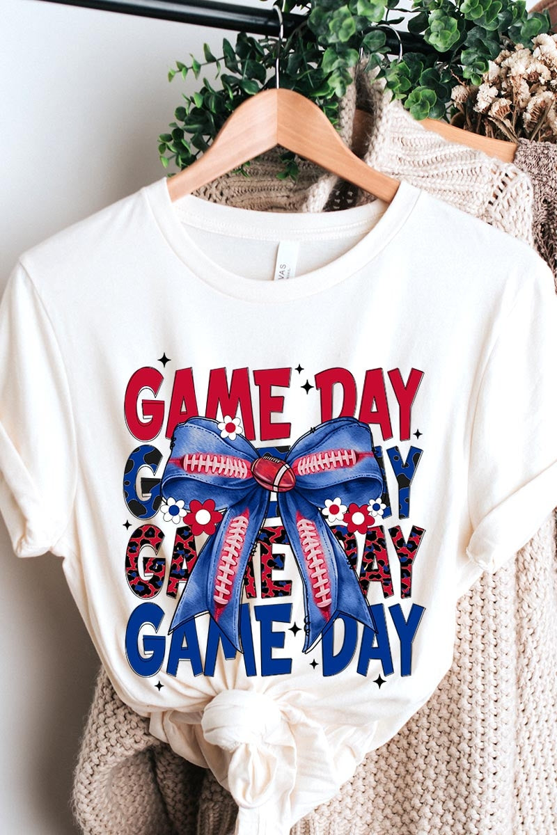 US3001P-E3087 Red Blue Football Game Day Bow Graphic Plus Tee $16