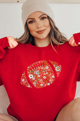 UL180-E3133 Floral Football Graphic Sweatshirt $20