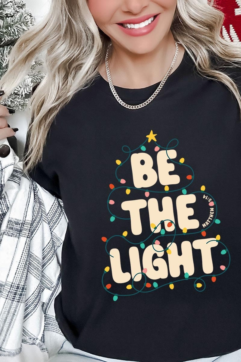 US3001P-E3202 Be the Light Christmas Graphic Plus Tee $16