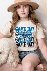 US3001Y-E3089Z Blue Silver Football Game Day Bow Kids Graphic Tee $11
