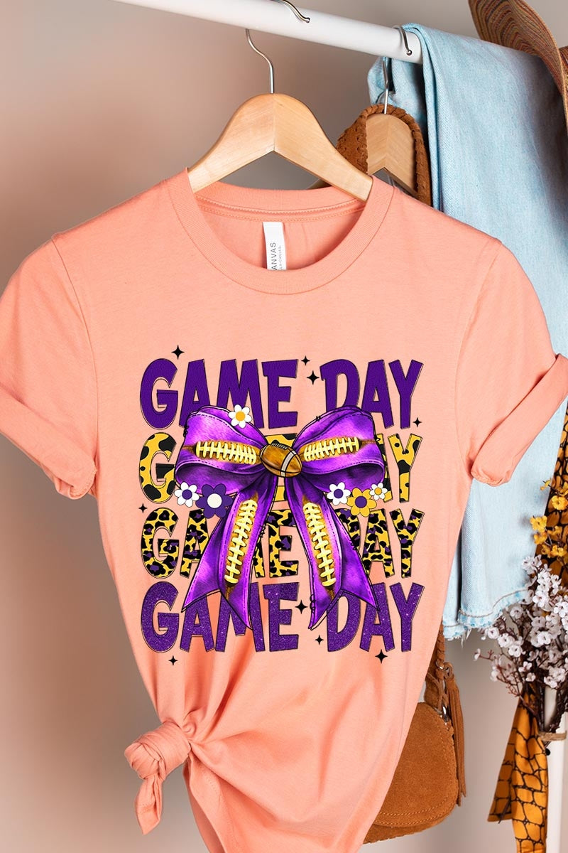 US3001-E3092 Purple Yellow Football Game Day Bow Graphic Tee $12.5