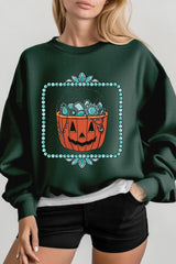 UL180-E3140 Halloween turquoise pumpkin Graphic Sweatshirt $20