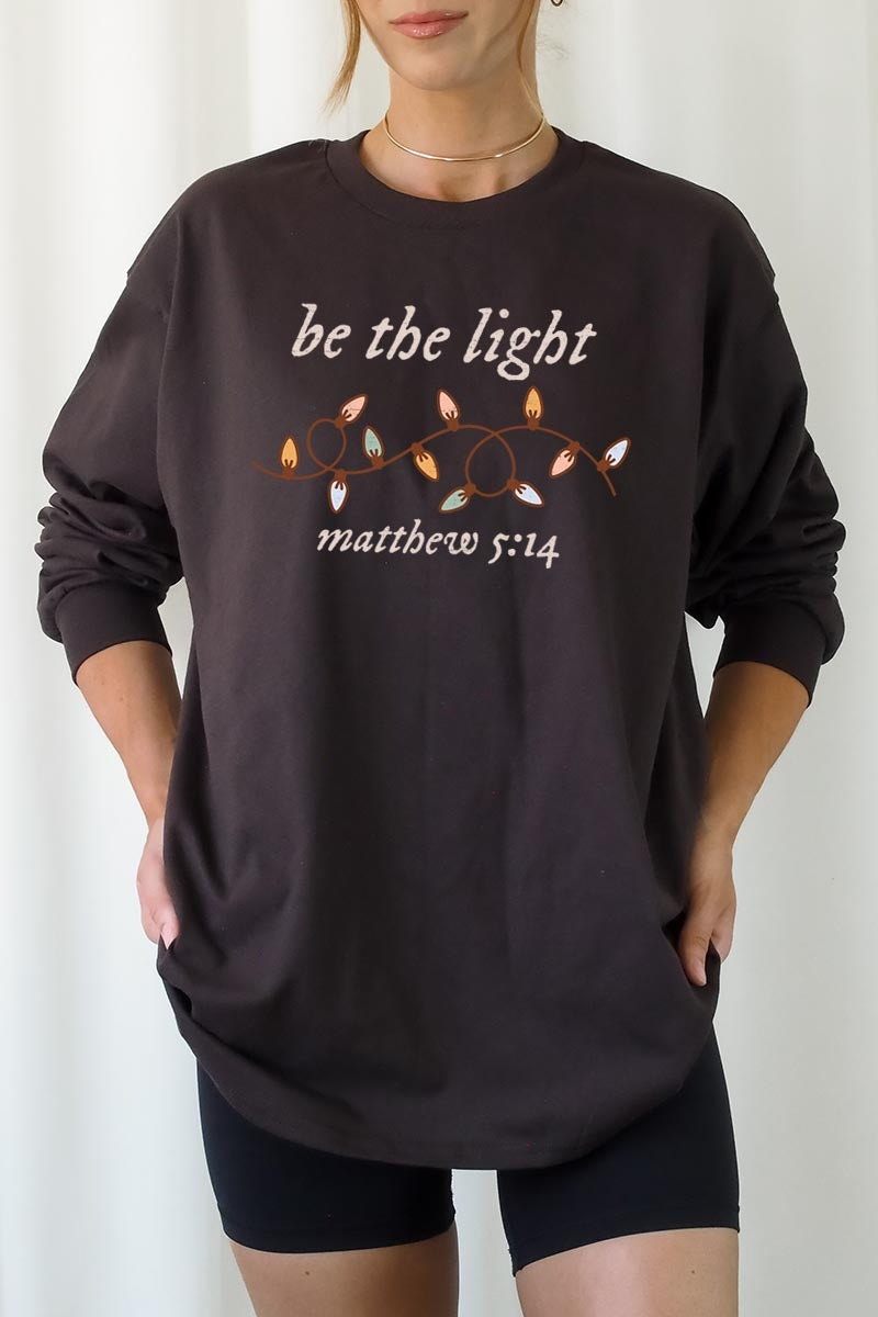 UL240P-E3214 Be the Light Christian Graphic Plus Long Sleeve Tee $17