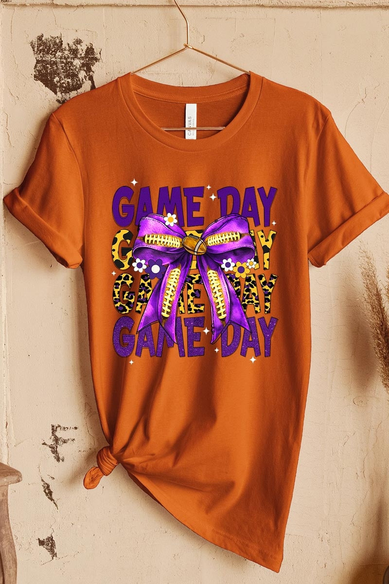 US3001-E3092 Purple Yellow Football Game Day Bow Graphic Tee $12.5