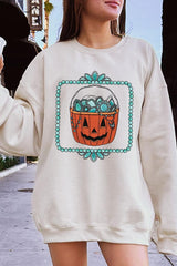 UL180-E3140 Halloween turquoise pumpkin Graphic Sweatshirt $20