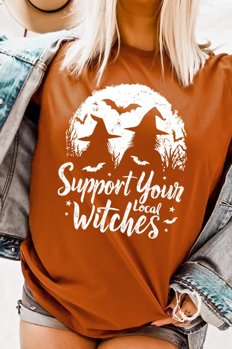 US3001P-E3161 Local Witches Halloween Graphic Plus Tee $16