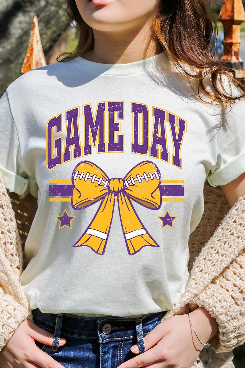 US3001-E3063 Purple Game Day Football Bow Graphic Tee $12.5