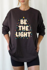 UL240-E3202 Be the Light Christmas Graphic Long Sleeve Tee $13.75