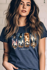 US3001P-E3204 Savior Is Born Nativity Graphic Plus Tee $16