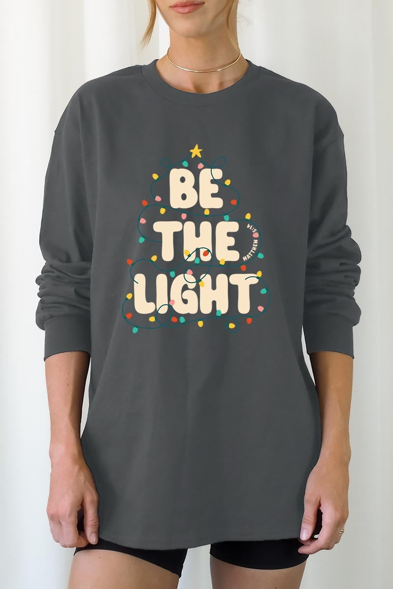 UL240-E3202 Be the Light Christmas Graphic Long Sleeve Tee $13.75