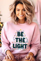 UL180P-E3202 Be the Light Christmas Graphic Plus Sweatshirt $25