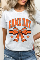 US3001P-E3064 Orange Game Day Football Bow Graphic Plus Tee $16