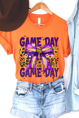 US3001-E3092 Purple Yellow Football Game Day Bow Graphic Tee $12.5