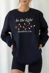 UL240-E3214 Be the Light Christian Graphic Long Sleeve Tee $13.75