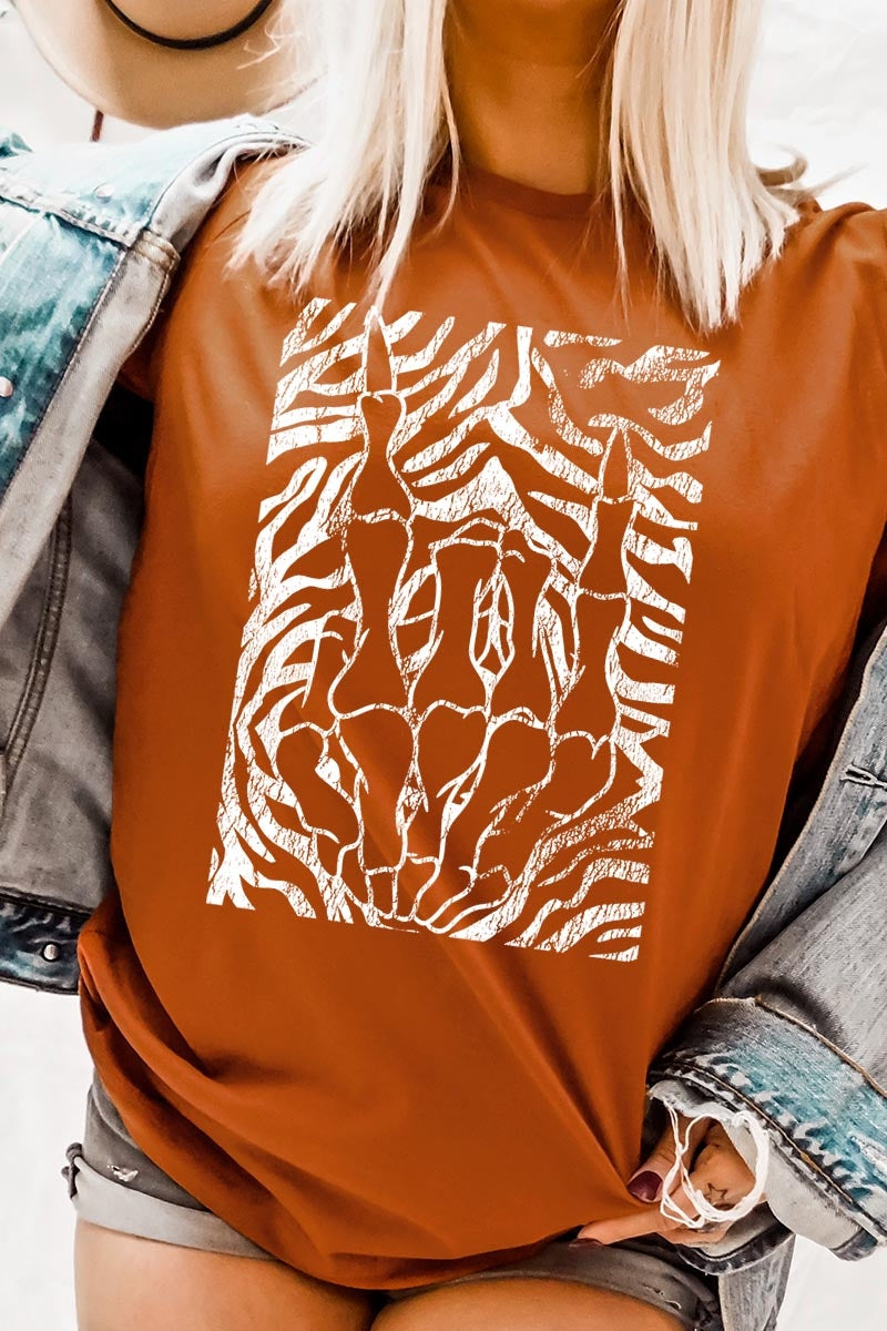 US3001P-E3177 Skeleton Hands Zebra Graphic Plus Tee $16