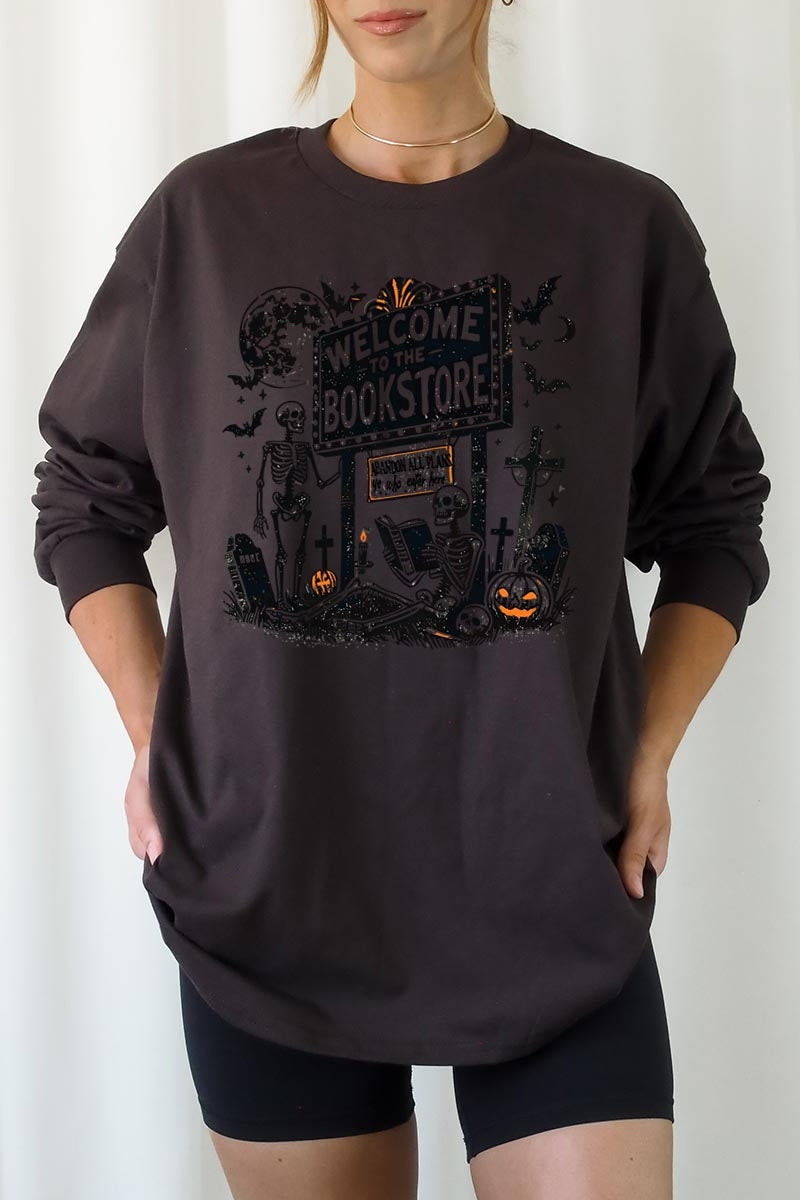 UL240-E3122 Bookstore Halloween Graphic Long Sleeve Tee $13.75
