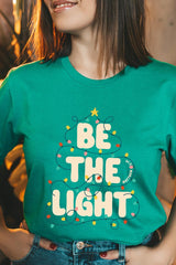 US3001-E3202 Be the Light Christmas Graphic Tee $12.5