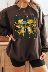 UL180P-E3090 Yellow Football Game Day Bow Plus Sweatshirt $25