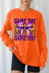 UL240-E3092 Purple Yellow Football GameDay Bow Long Sleeve Tee $13.75