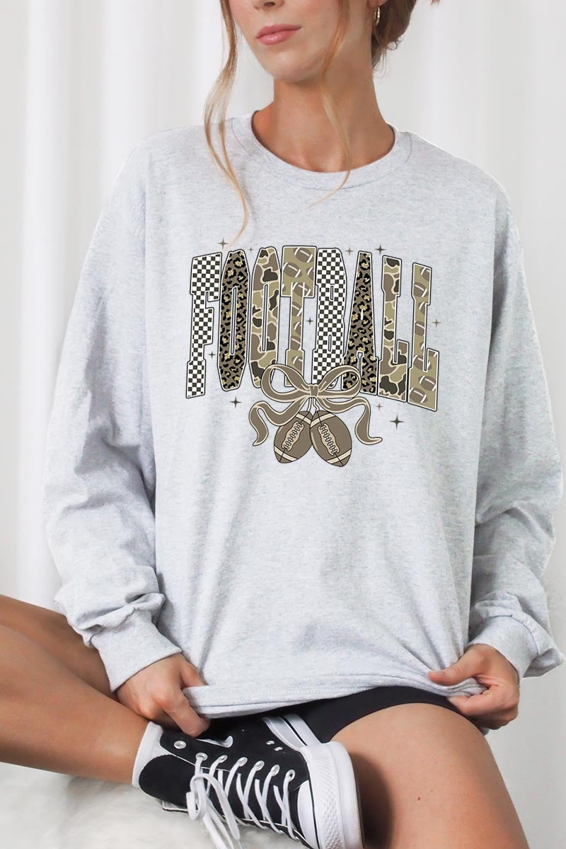 UL240-E3132 Camo Football Graphic Long Sleeve Tee $13.75