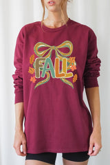 UL240P-E3121 Fall Brushstroke Bow Graphic Plus Long Sleeve Tee $17