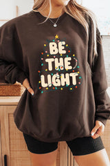 UL180-E3202 Be the Light Christmas Graphic Sweatshirt $20