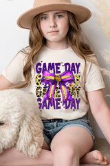 US3001Y-E3092Z Purple Yellow Football Game Day Bow Kids Tee $11