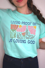 US3001P-E3066 Living Proof of a Loving God Graphic Plus Tee $16