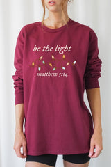 UL240P-E3214 Be the Light Christian Graphic Plus Long Sleeve Tee $17