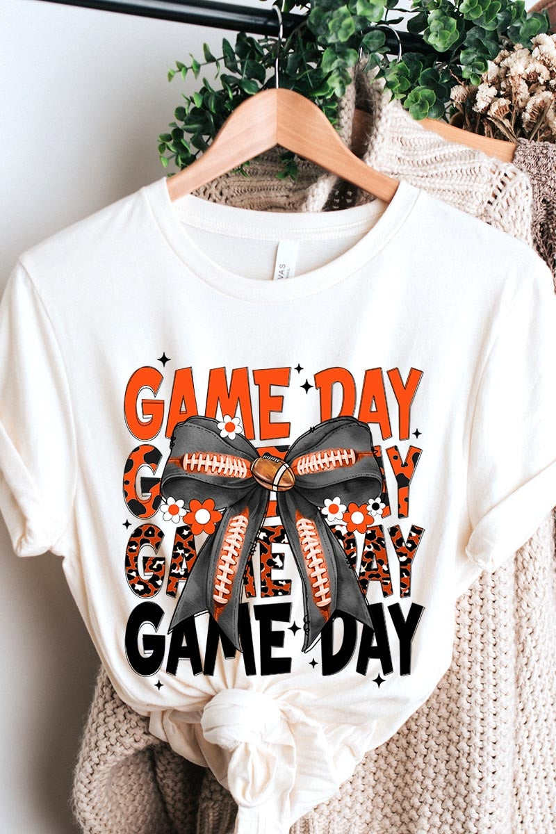 US3001P-E3088 Orange Black Football Game Day Bow Plus Tee $16