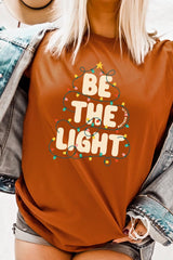 US3001P-E3202 Be the Light Christmas Graphic Plus Tee $16