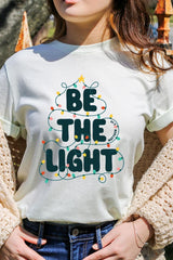 US3001-E3202 Be the Light Christmas Graphic Tee $12.5
