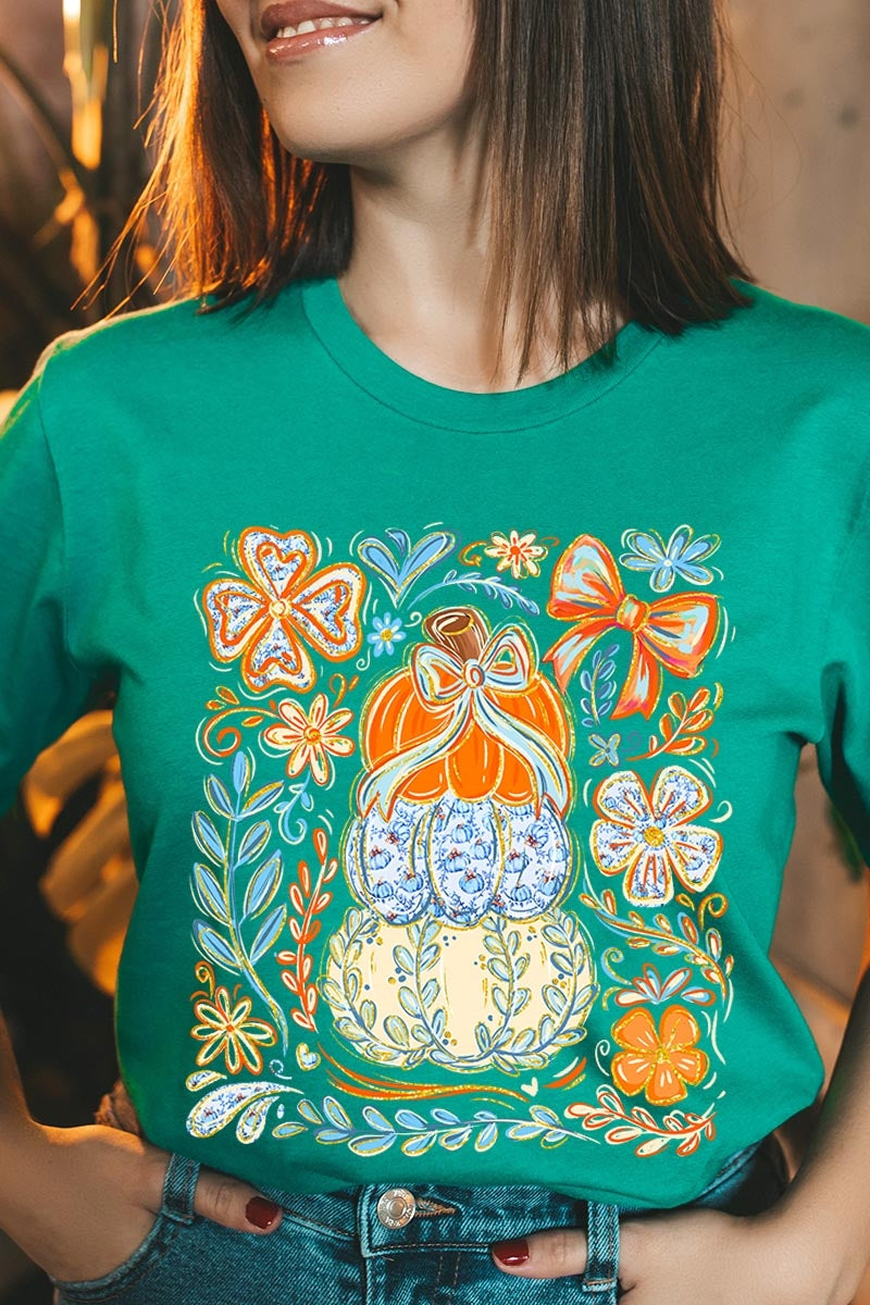 US3001-E3153 Floral Pumpkin Stack Graphic Tee $12.5