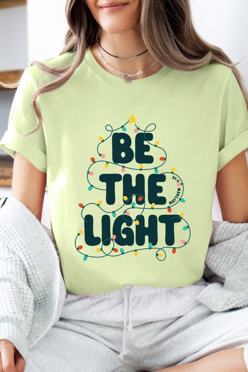 US3001P-E3202 Be the Light Christmas Graphic Plus Tee $16