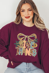 UL180P-E3154 Give Thanks Bow Graphic Plus Sweatshirt $25
