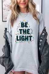 US3001-E3202 Be the Light Christmas Graphic Tee $12.5