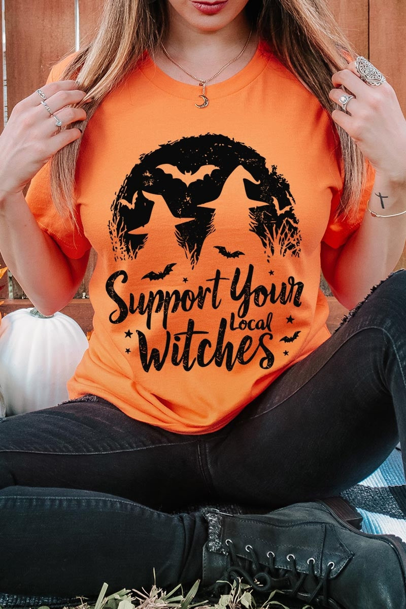 US3001P-E3161 Local Witches Halloween Graphic Plus Tee $16