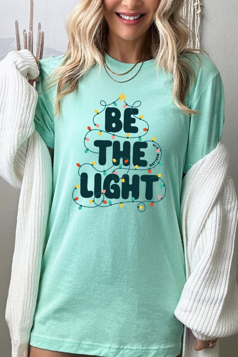 US3001P-E3202 Be the Light Christmas Graphic Plus Tee $16