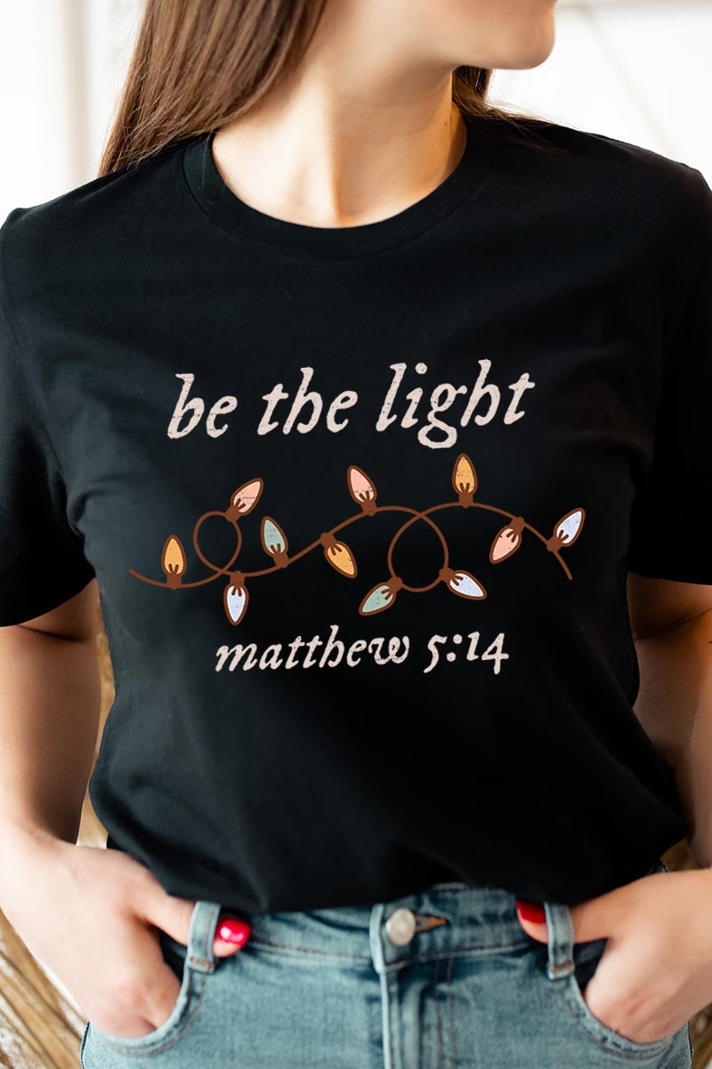 US3001-E3214 Be the Light Christian Graphic Tee $12.5