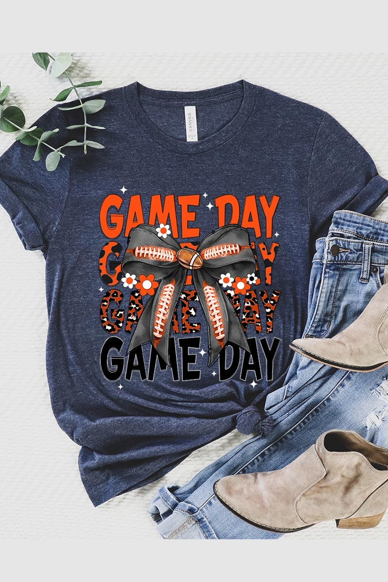 US3001-E3088 Orange Black Football Game Day Bow Graphic Tee $12.5