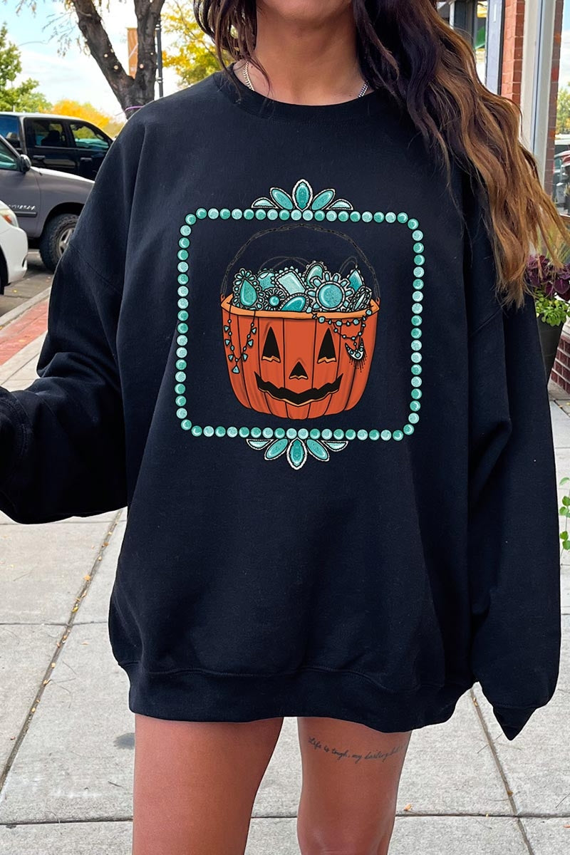UL180-E3140 Halloween turquoise pumpkin Graphic Sweatshirt $20