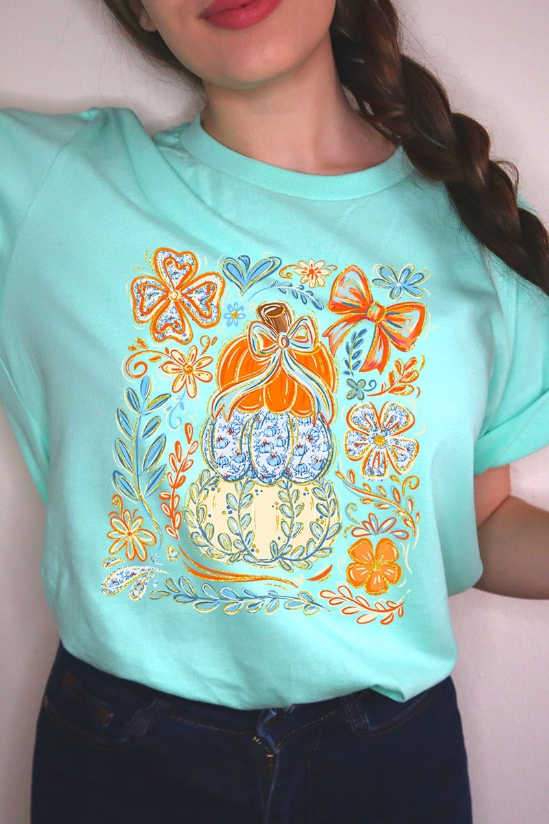 US3001-E3153 Floral Pumpkin Stack Graphic Tee $12.5