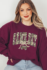 UL180-E3131 Football Game Day Camo Graphic Sweatshirt $20