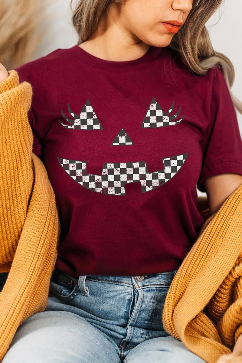 US3001P-E3149 Checker Pumpkin Face Graphic Plus Tee $16