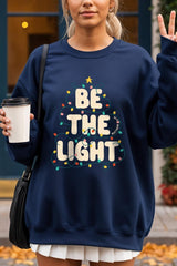 UL180P-E3202 Be the Light Christmas Graphic Plus Sweatshirt $25