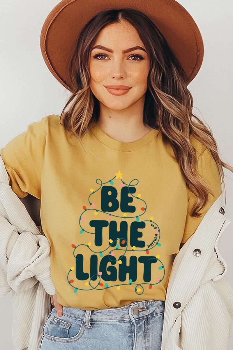 US3001P-E3202 Be the Light Christmas Graphic Plus Tee $16