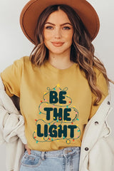 US3001-E3202 Be the Light Christmas Graphic Tee $12.5