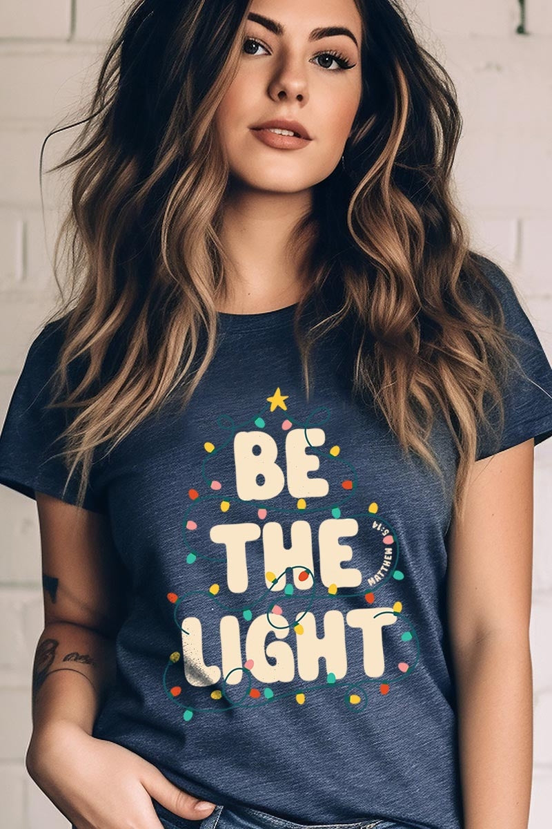 US3001-E3202 Be the Light Christmas Graphic Tee $12.5
