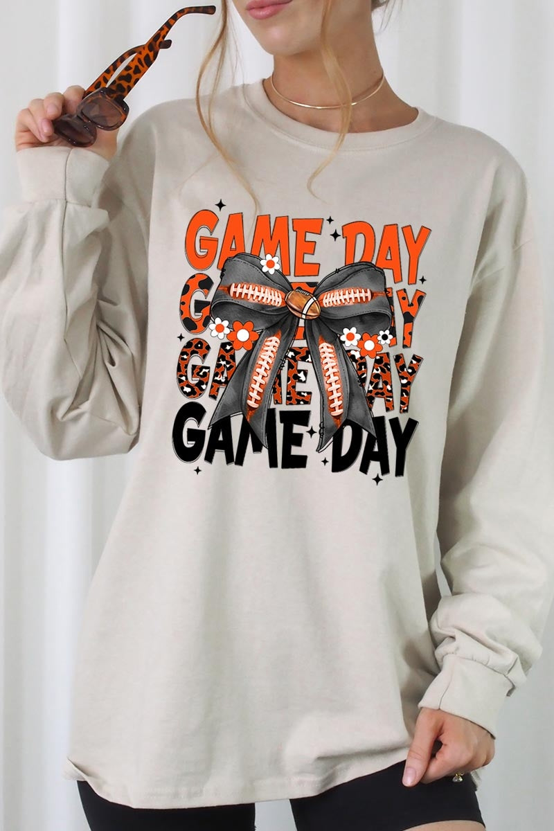 UL240-E3088 Orange Black Football Game Day Bow Long Sleeve Tee $13.75